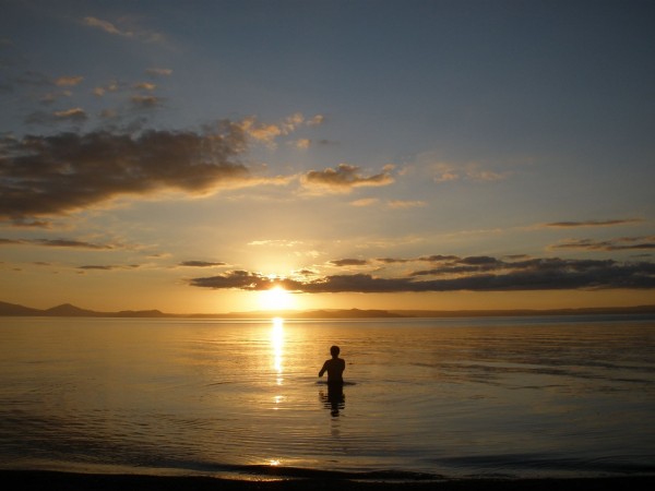 Gorgeous sunset at the Lake Taupo with Ryan playing skipping stones