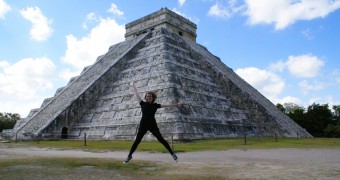 Ashley jumping in Chichen Itza, Yucatán Peninsula, Mexico. © No Onion Extra Pickles.
