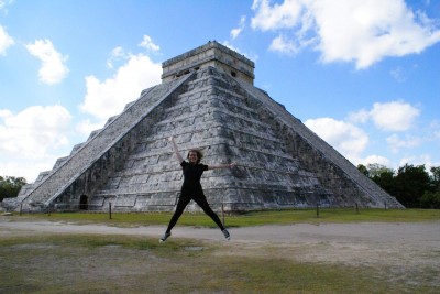 Ashley jumping in Chichen Itza, YucatÃ¡n Peninsula, Mexico. Â© No Onion Extra Pickles.