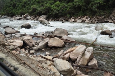 Top modes of transportation - Derailed train track ... I guess that's the old track, down there in the river. © David Douglas