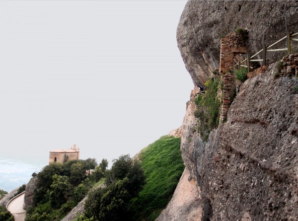 Montserrat Monastery - broken down hermitage in a precarious cleft - from far Hermitage of Sant Joan (left) and the precarious one (right)