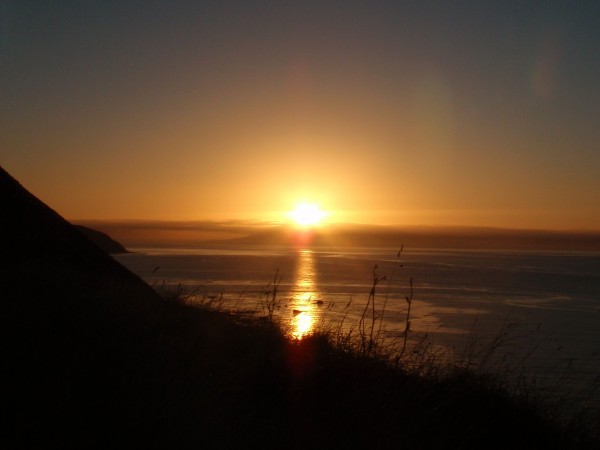 Sunset overlooking the South Island, from the North Island (New Zealand)