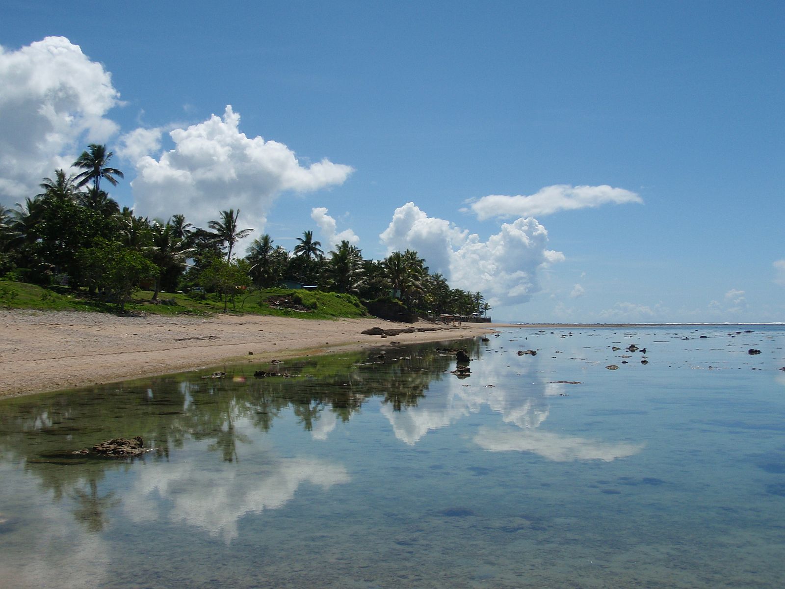 Perfect reflection on a Fijian lagoon. Sigatoka, Fiji.