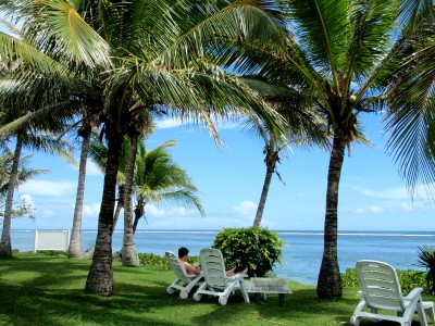 Relaxing under coconut tree overlooking a Fijian lagoon