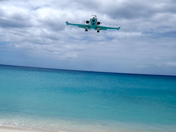 Maho Beach, Sint Maarten, Caribbean: An approaching airplane