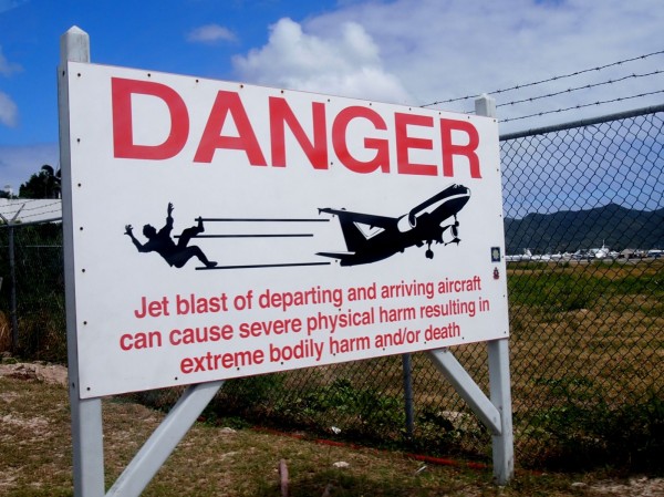 Maho Beach, Sint Maarten, Caribbean: Danger warning sign