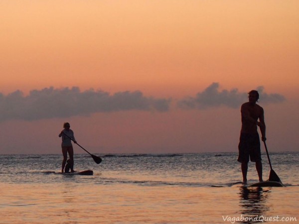 Sunset paddleboarding in Roatan, Honduras