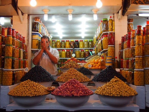 Pickled olive vendor in the souk of Medina Quarter, Red City Marrakech, Morocco