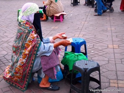A fortuneteller in Jemaa el-Fna (Marrakech, Morocco) A fortuneteller in Jemaa el-Fna (Marrakech, Morocco)